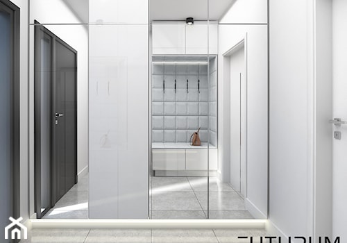Projekt wnętrz domu jednorodzinnego w Śremie. - Średni z wieszakiem biały hol / przedpokój, styl nowoczesny - zdjęcie od FUTURUM ARCHITECTURE