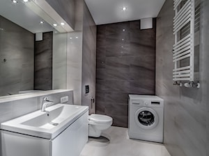 Nowoczesna aranżacja mieszkania pod wynajem - Mała bez okna z pralką / suszarką z lustrem z punktowym oświetleniem łazienka, styl nowoczesny - zdjęcie od MG Invest Park