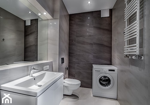 Nowoczesna aranżacja mieszkania pod wynajem - Mała bez okna z pralką / suszarką z lustrem z punktowym oświetleniem łazienka, styl nowoczesny - zdjęcie od MG Invest Park