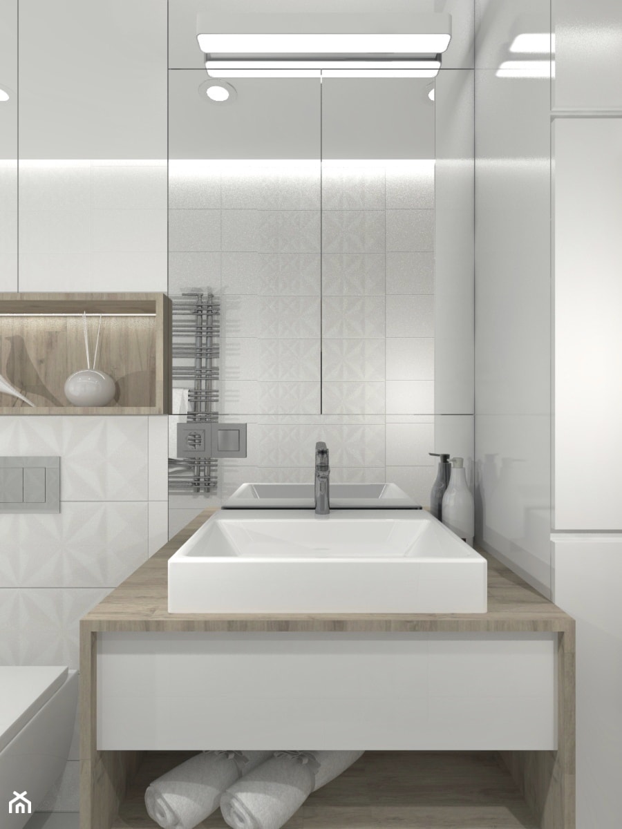 Łazienka w bieli i drewnie- Mieszkanie w Pruszkowie - zdjęcie od DIZU Studio Projektowe