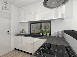 Nowoczesna kuchnia w bieli i czerni - zdjęcie od DIZU Studio Projektowe