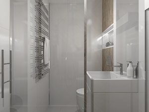 Malutka łazienka w bieli i drewnie- Mieszkanie w Pruszkowie - zdjęcie od DIZU Studio Projektowe