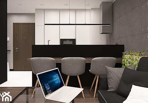 DLA SINGLA - Średnia otwarta z salonem czarna z zabudowaną lodówką kuchnia dwurzędowa, styl minimalistyczny - zdjęcie od FAMM DESIGN