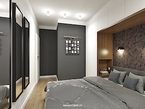 Grafit - Średnia biała czarna sypialnia, styl skandynawski - zdjęcie od idea projekt