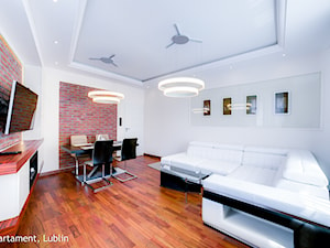 Metamorfozzzza apartament ul.Kowalska Lublin - Średni biały salon z jadalnią, styl minimalistyczny - zdjęcie od Auraprojekt