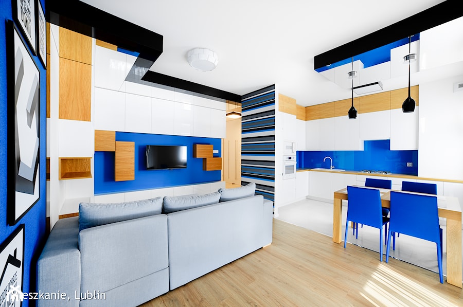 mieszkanie 60m2 ul.Kryształowa Lublin - Duża biała niebieska jadalnia w salonie w kuchni, styl minimalistyczny - zdjęcie od Auraprojekt