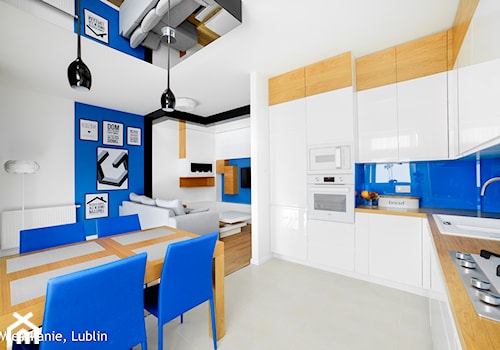 mieszkanie 60m2 ul.Kryształowa Lublin - Średnia biała niebieska jadalnia w salonie w kuchni, styl minimalistyczny - zdjęcie od Auraprojekt