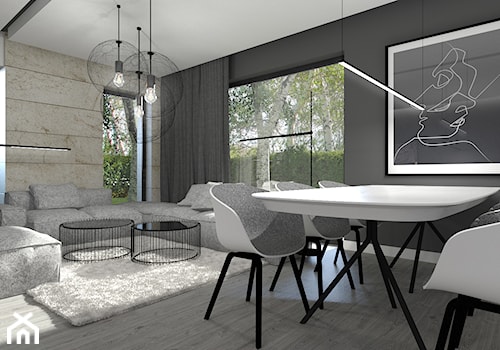 DOM POKAZOWY minimal - Duża czarna jadalnia w salonie, styl minimalistyczny - zdjęcie od gradomska architekci