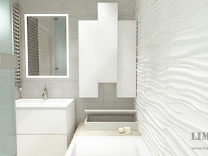 Mieszkanie w szarościach w stylu skandynawskim - Mała na poddaszu bez okna z lustrem łazienka, styl nowoczesny - zdjęcie od Limonka Design Group