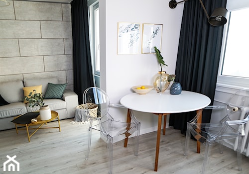 Kawalerka - Mała biała jadalnia w salonie, styl nowoczesny - zdjęcie od SWISS KRONO