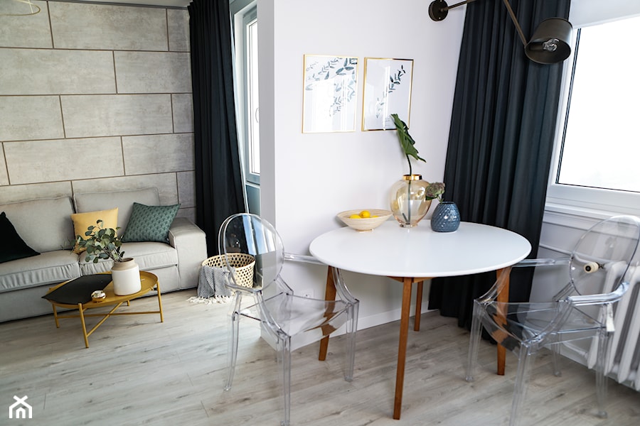Kawalerka - Mała biała jadalnia w salonie, styl nowoczesny - zdjęcie od SWISS KRONO