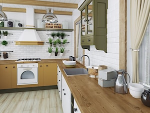 Blaty kuchenne - Duża z salonem biała z zabudowaną lodówką z podblatowym zlewozmywakiem kuchnia w kształcie litery l z oknem - zdjęcie od SWISS KRONO
