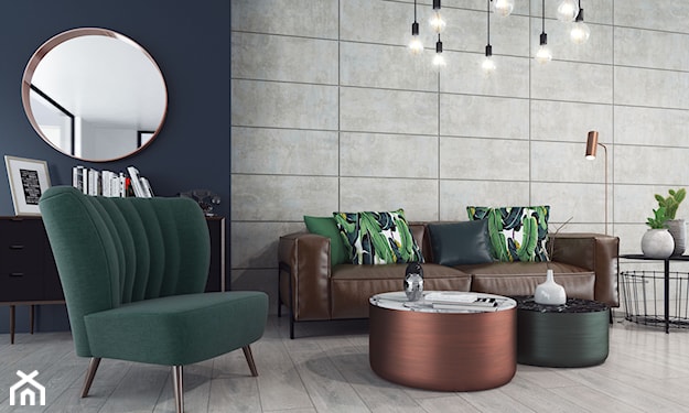 granatowa ściana, zielony fotel, szare panele, skórzana sofa, zielone poduszki