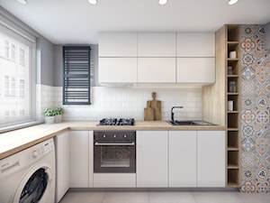 Remont mieszkania 50m2 - Średnia zamknięta biała szara z zabudowaną lodówką z nablatowym zlewozmywakiem kuchnia w kształcie litery l z oknem, styl nowoczesny - zdjęcie od Przestrzenie