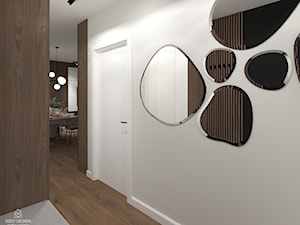 Projekt. Mieszkanie z kolorem przewodnim - Hol / przedpokój - zdjęcie od SZED DESIGN grafika i wnętrza