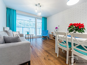 Nowoczesne mieszkanie "Niebieskie" - Średni biały salon z jadalnią z tarasem / balkonem, styl skandynawski - zdjęcie od Kolektyw D2