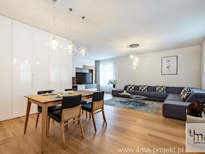 Projekt mieszkania 160 m2 na Mokotowie. - Średni biały salon z jadalnią, styl nowoczesny - zdjęcie od 4ma projekt