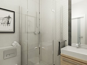 Projekt mieszkania na Bielanach o pow. 51,5 m2. - Mała na poddaszu bez okna z lustrem łazienka, styl nowoczesny - zdjęcie od 4ma projekt