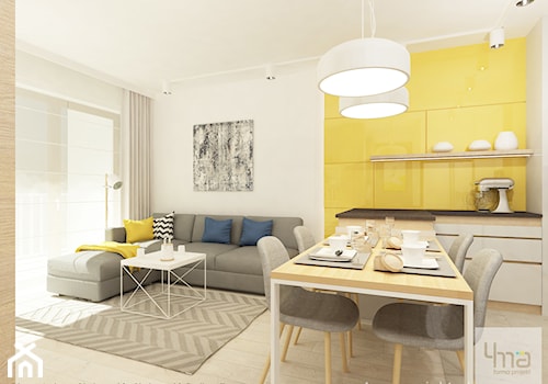 Projekt mieszkania o pow. 55,5 m2 w Wilanowie. - Średni biały żółty salon z jadalnią, styl nowoczesny - zdjęcie od 4ma projekt