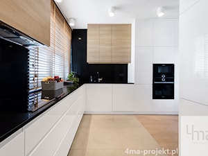 Mieszkanie 117m2 na Kabatach - Duża zamknięta z kamiennym blatem czarna z zabudowaną lodówką kuchnia w kształcie litery l z oknem, styl nowoczesny - zdjęcie od 4ma projekt