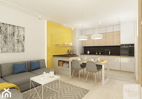 Projekt mieszkania o pow. 55,5 m2 w Wilanowie. - Średnia otwarta z salonem biała czarna żółta z zabudowaną lodówką z lodówką wolnostojącą z podblatowym zlewozmywakiem kuchnia jednorzędowa z marmurem nad blatem kuchennym, styl nowoczesny - zdjęcie od 4ma projekt