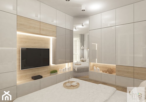 Projekt mieszkania w Pruszkowie - pow. 52,5 m2. - Duża biała sypialnia z balkonem / tarasem, styl nowoczesny - zdjęcie od 4ma projekt