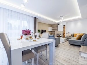 Dom w Łomiankach 135 m2. - Duży biały brązowy salon z jadalnią, styl nowoczesny - zdjęcie od 4ma projekt