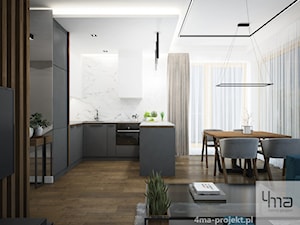 Mieszkanie o pow. 52 m2 w Grodzisku Mazowieckim - Mała otwarta z salonem biała z zabudowaną lodówką z nablatowym zlewozmywakiem kuchnia w kształcie litery u, styl nowoczesny - zdjęcie od 4ma projekt