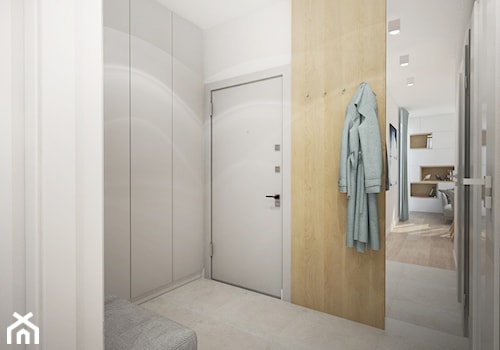 Mieszkanie 48,5 m2 - Średni z wieszakiem biały hol / przedpokój, styl nowoczesny - zdjęcie od 4ma projekt