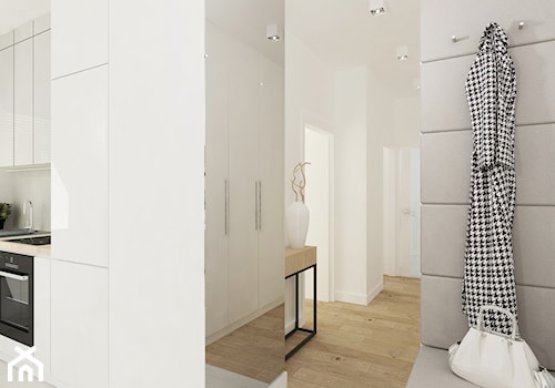 Projekt mieszkania na Bielanach o pow. 51,5 m2. - Mały z wieszakiem biały hol / przedpokój, styl no ... - zdjęcie od 4ma projekt