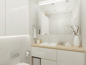 Projekt mieszkania na Bielanach o pow. 51,5 m2. - Mała bez okna z punktowym oświetleniem łazienka, styl nowoczesny - zdjęcie od 4ma projekt