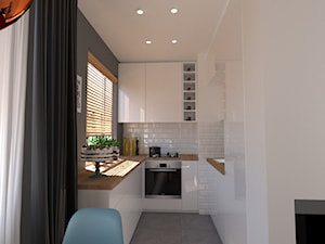 NOWOCZESNE MIESZKANIE W CHORZOWIE - Mała otwarta szara z zabudowaną lodówką z nablatowym zlewozmywakiem kuchnia w kształcie litery u z oknem, styl nowoczesny - zdjęcie od Architekt Anna Maj