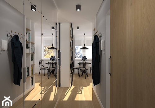 Metamorfoza Mieszkania 33 m2 - Średni z wieszakiem szary hol / przedpokój, styl nowoczesny - zdjęcie od CKkwadrat