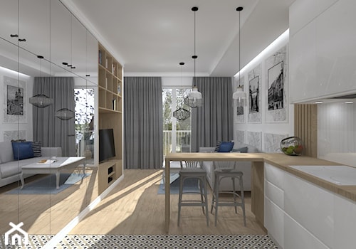 Ekskluzywna Kawalerka - Średnia otwarta z salonem biała z zabudowaną lodówką kuchnia w kształcie litery l z oknem, styl nowoczesny - zdjęcie od CKkwadrat