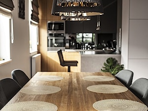 Widok na jadalnię i kuchnie w tle - zdjęcie od BscProjekt