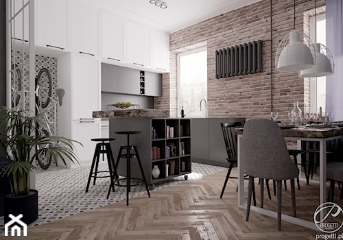 Mieszkanie w klimatycznej kamienicy - Średnia brązowa jadalnia w salonie w kuchni, styl industrialn ... - zdjęcie od Progetti Architektura