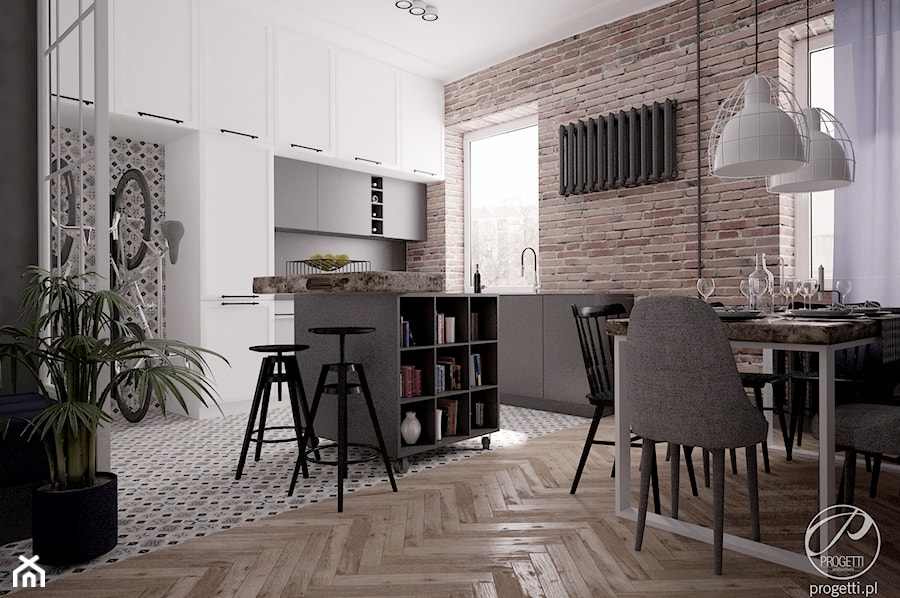 Mieszkanie w klimatycznej kamienicy - Średnia brązowa jadalnia w salonie w kuchni, styl industrialn ... - zdjęcie od Progetti Architektura
