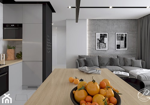 Apartament dla dwojga - Średni biały czarny salon z kuchnią z jadalnią, styl nowoczesny - zdjęcie od Progetti Architektura