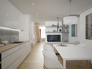 Przebudowa domu z aranżacją wnętrz - Średnia z salonem biała szara z zabudowaną lodówką z podblatowym zlewozmywakiem kuchnia jednorzędowa, styl nowoczesny - zdjęcie od ROARHIDE Industrial Designs
