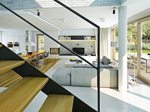 ATRAKCYJNY 1 - projekt z elewacją klinkierową - Duży biały salon z kuchnią z jadalnią z tarasem / balkonem, styl nowoczesny - zdjęcie od DOMY Z WIZJĄ - nowoczesne projekty domów