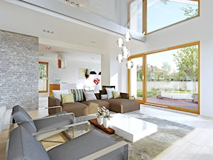 Z CHARAKTEREM 1 - nowoczesny dom z antresolą i podwójnym garażem - Średni biały salon z tarasem / balkonem z antresolą, styl minimalistyczny - zdjęcie od DOMY Z WIZJĄ - nowoczesne projekty domów