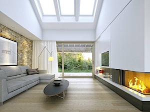 RODZINNY 1 - dom parterowy z dachem dwuspadowym - Duży biały salon z tarasem / balkonem, styl minimalistyczny - zdjęcie od DOMY Z WIZJĄ - nowoczesne projekty domów
