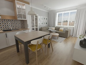 salon z aneksem 21 m2 - Mała otwarta z salonem szara z zabudowaną lodówką z nablatowym zlewozmywakiem kuchnia jednorzędowa z oknem - zdjęcie od white interior design