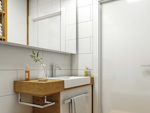 biała łazienka-drewniane akcenty - zdjęcie od MIKOŁAJSKAstudio