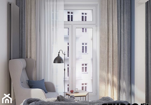 Kompaktowo w Warszawie - Mała biała niebieska sypialnia, styl nowoczesny - zdjęcie od MIKOŁAJSKAstudio