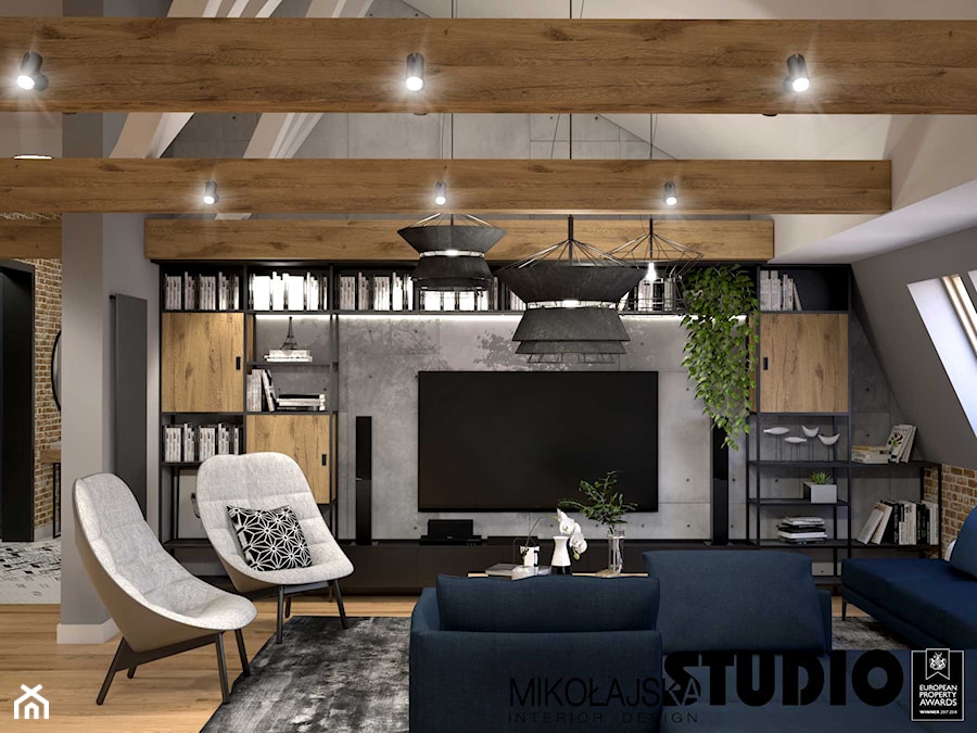 Apartament na strychu - Średni biały szary salon z bibiloteczką, styl industrialny - zdjęcie od MIKOŁAJSKAstudio