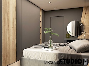 Apartament przy ul. Lema - Średnia czarna sypialnia, styl nowoczesny - zdjęcie od MIKOŁAJSKAstudio