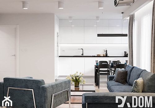 Minimalistyczne mieszkanie - Duży biały salon z kuchnią z jadalnią z tarasem / balkonem, styl minimalistyczny - zdjęcie od Dom-Art