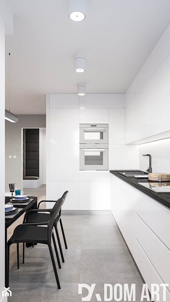 Minimalistyczne mieszkanie - Duża otwarta z salonem z kamiennym blatem z zabudowaną lodówką z nablatowym zlewozmywakiem kuchnia w kształcie litery l, styl minimalistyczny - zdjęcie od Dom-Art - Homebook