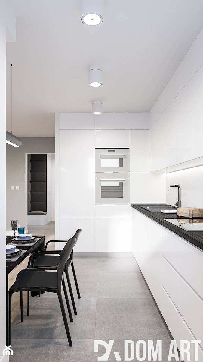 Minimalistyczne mieszkanie - Duża otwarta z salonem z kamiennym blatem z zabudowaną lodówką z nablatowym zlewozmywakiem kuchnia w kształcie litery l, styl minimalistyczny - zdjęcie od Dom-Art